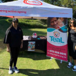 TEAL's Carmel Murugen and Mennessa Peters create awareness of the service at Tafta's Golf Day