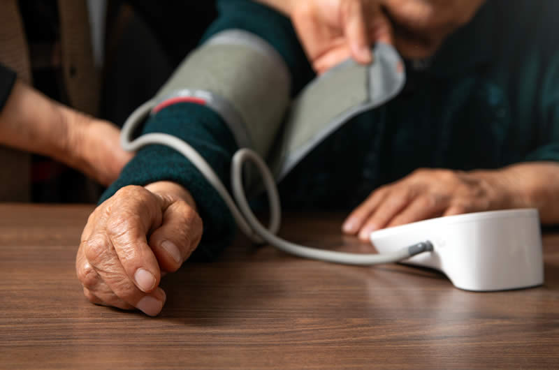 checking blood pressure
